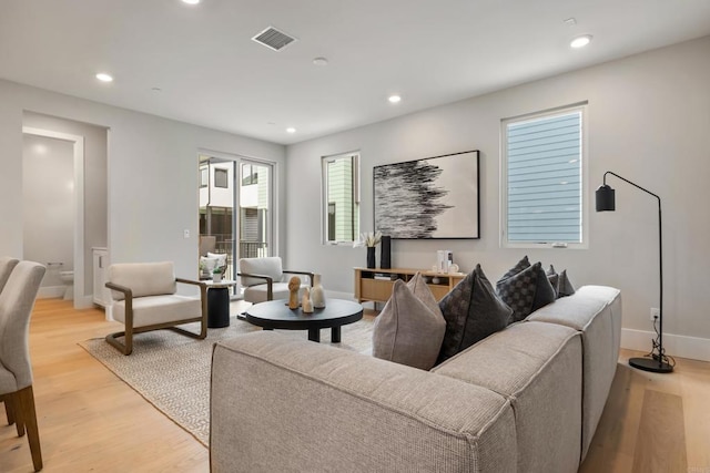 3584 Garfield St, Carlsbad, CA 92008 - living area featuring light wood-style flooring and recessed lighting