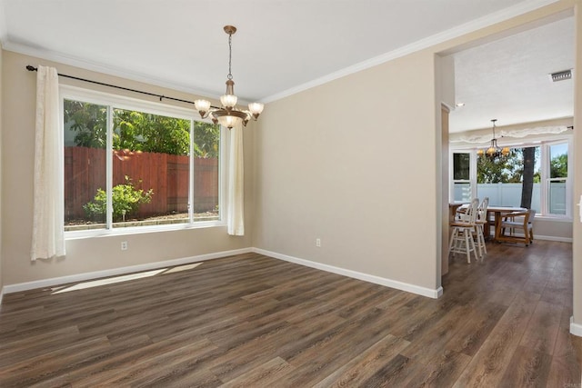 943 Masters Dr, Oceanside, CA 92057 - empty room featuring a chandelier, healthy amount of natural light, dark wood-style floors, and crown molding