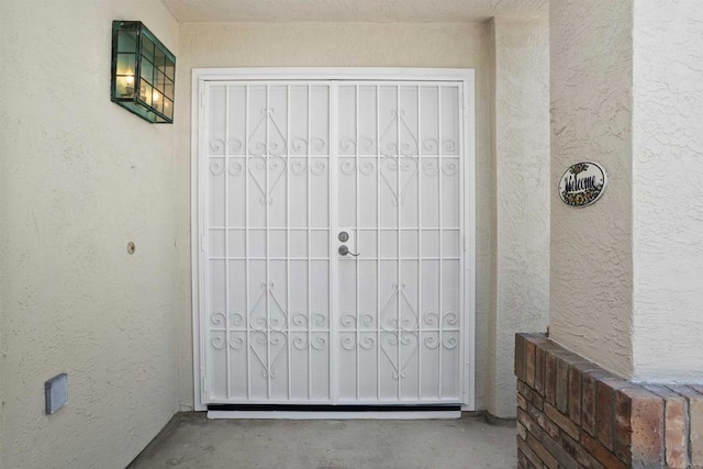943 Masters Dr, Oceanside, CA 92057 - doorway to property with stucco siding