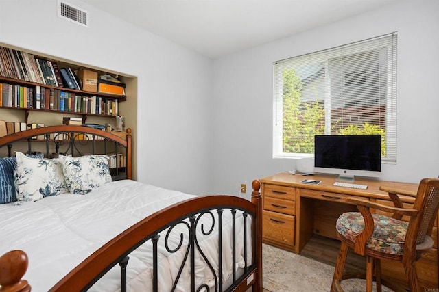 943 Masters Dr, Oceanside, CA 92057 - bedroom with an office area and light wood-type flooring
