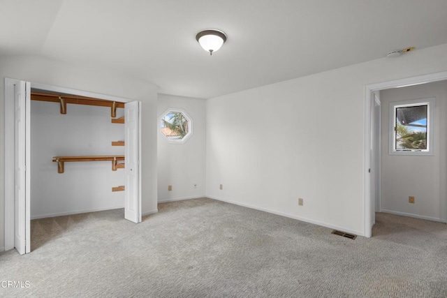 2524 Monaco Dr, Oxnard, CA 93035 - unfurnished bedroom featuring carpet floors, a closet, and lofted ceiling