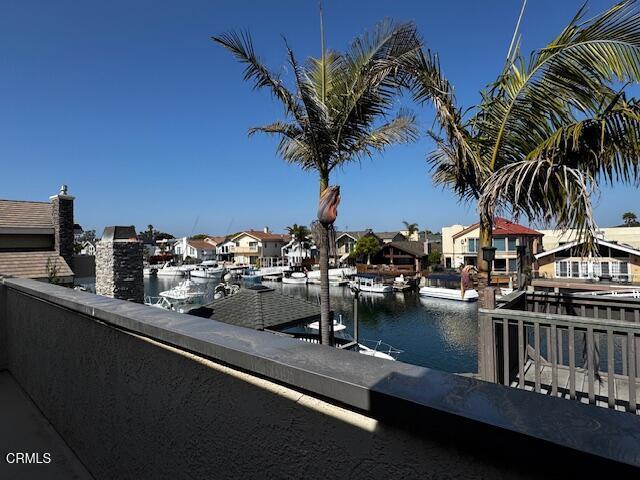 2524 Monaco Dr, Oxnard, CA 93035 - dock area featuring a water view and a residential view