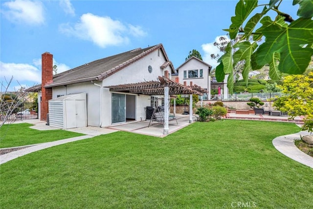 6322 E E W View Dr, Orange, CA 92869 - back of property featuring a pergola, a patio area, stucco siding, and a chimney