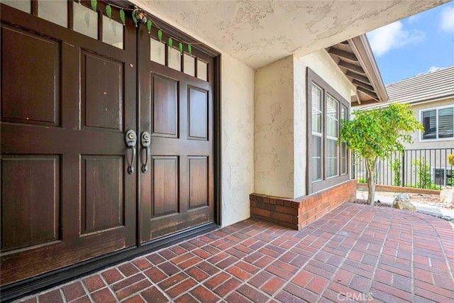 6322 E E W View Dr, Orange, CA 92869 - doorway to property featuring stucco siding and french doors
