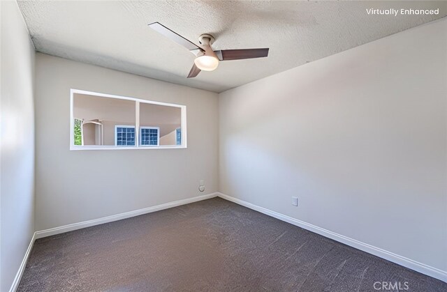 1219 221st St W, Torrance, CA 90502 - spare room featuring dark carpet, a ceiling fan, and a textured ceiling