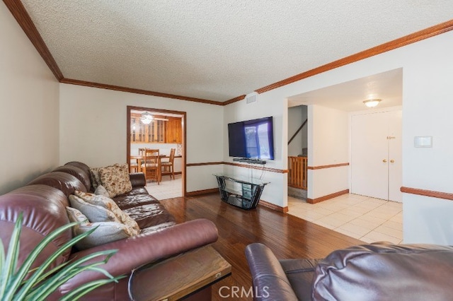 1219 221st St W, Torrance, CA 90502 - living area with a textured ceiling, ornamental molding, and wood finished floors