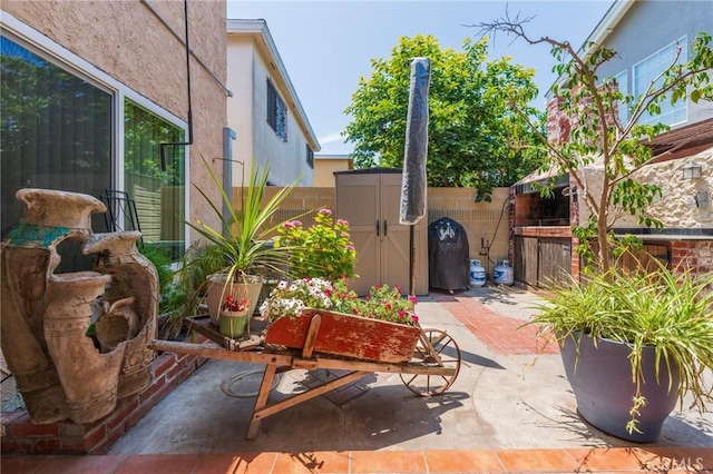 1219 221st St W, Torrance, CA 90502 - fenced backyard featuring a patio and a shed
