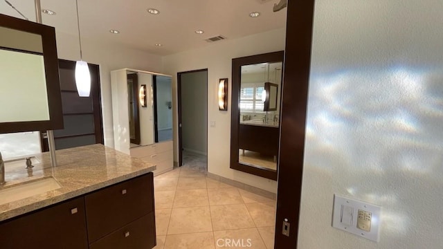 25105 Via Von Batsch, Moreno Valley, CA 92557 - bathroom with tile patterned flooring, vanity, and recessed lighting