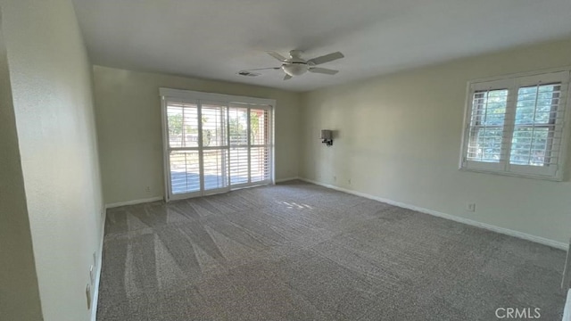 25105 Via Von Batsch, Moreno Valley, CA 92557 - carpeted empty room with healthy amount of natural light and ceiling fan