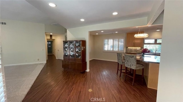 25105 Via Von Batsch, Moreno Valley, CA 92557 - dining space with dark wood finished floors and recessed lighting