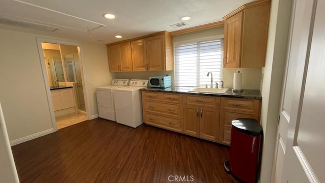 25105 Via Von Batsch, Moreno Valley, CA 92557 - laundry area featuring cabinet space, washing machine and clothes dryer, dark wood-style flooring, recessed lighting, and attic access