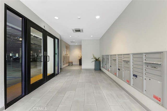 2526 Nolita, Irvine, CA 92612 - corridor featuring mail area and recessed lighting