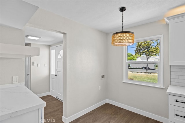 1514 E Palm Ave, Orange, CA 92866 - unfurnished dining area with dark wood-style floors and a chandelier