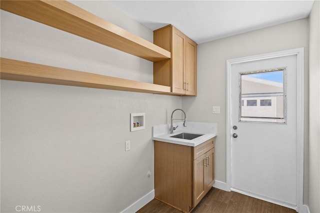 1514 E Palm Ave, Orange, CA 92866 - laundry area featuring washer hookup, dark wood-style flooring, and cabinet space