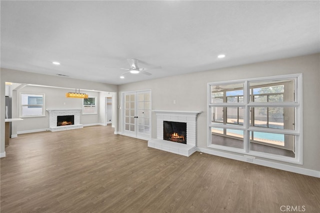 1514 E Palm Ave, Orange, CA 92866 - unfurnished living room with a fireplace, wood finished floors, a ceiling fan, and recessed lighting