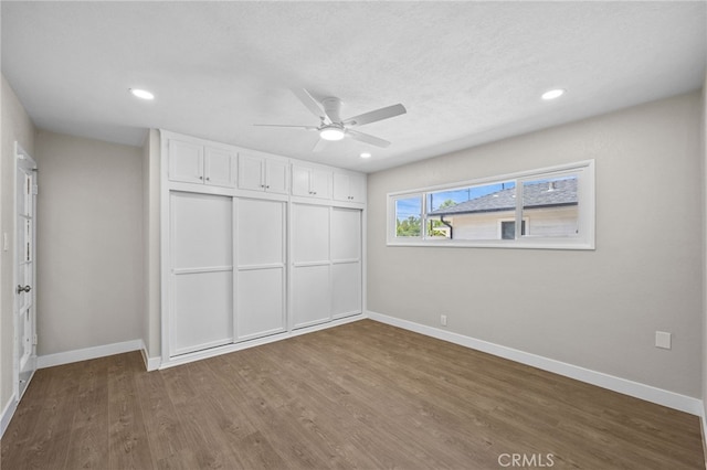 1514 E Palm Ave, Orange, CA 92866 - unfurnished bedroom featuring wood finished floors, a closet, recessed lighting, and ceiling fan
