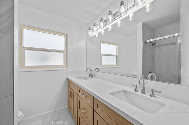 1514 E Palm Ave, Orange, CA 92866 - bathroom with double vanity, marble finish flooring, and a marble finish shower