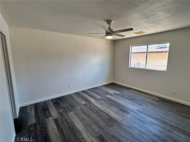 6162 Chia Ave Unit 29, Palms, CA 92277 - spare room with a ceiling fan, dark wood-type flooring, and a textured ceiling