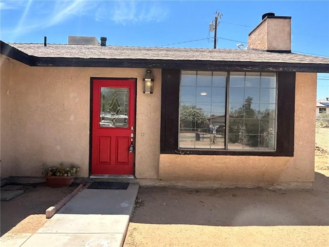 6162 Chia Ave Unit 29, Palms, CA 92277 - entrance to property with stucco siding