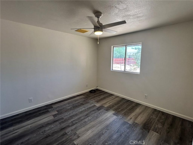 6162 Chia Ave Unit 29, Palms, CA 92277 - empty room featuring dark wood-type flooring, a textured ceiling, and a ceiling fan