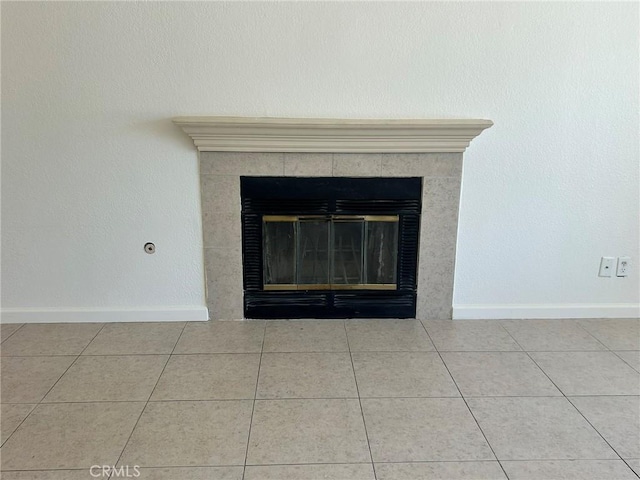 6162 Chia Ave Unit 29, Palms, CA 92277 - detailed view of baseboards and a fireplace