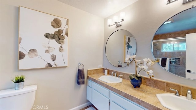 496 Crane Blvd, Los Angeles, CA 90065 - bathroom with double vanity and a shower with door
