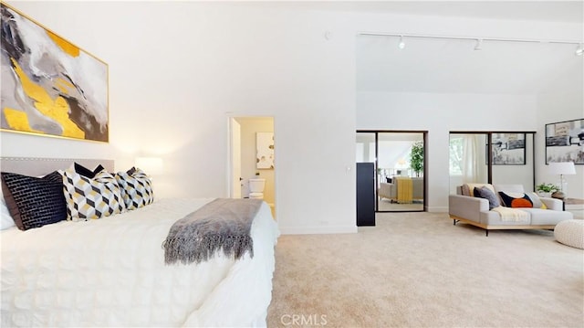496 Crane Blvd, Los Angeles, CA 90065 - carpeted bedroom featuring track lighting and a high ceiling