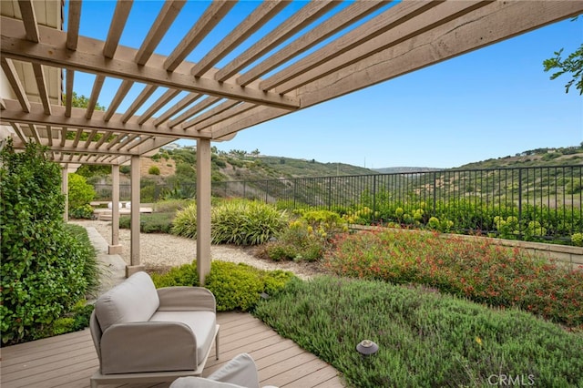 1606 Reef View Cir, Corona Del Mar, CA 92625 - deck featuring a pergola, a fenced backyard, and a mountain view