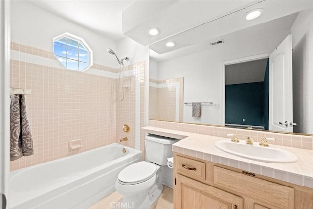 31148 Kahwea Rd, Temecula, CA 92591 - bathroom with vanity, tub / shower combination, recessed lighting, and backsplash