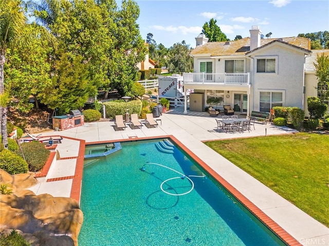 31148 Kahwea Rd, Temecula, CA 92591 - view of pool with a patio, a pool with connected hot tub, and area for grilling