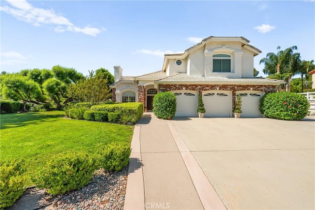 31148 Kahwea Rd, Temecula, CA 92591 - mediterranean / spanish-style house with a garage, a front lawn, driveway, a chimney, and stucco siding