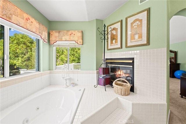 31148 Kahwea Rd, Temecula, CA 92591 - bathroom with a tub with jets and a tiled fireplace