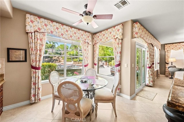 31148 Kahwea Rd, Temecula, CA 92591 - dining space with plenty of natural light, light tile patterned floors, and ceiling fan