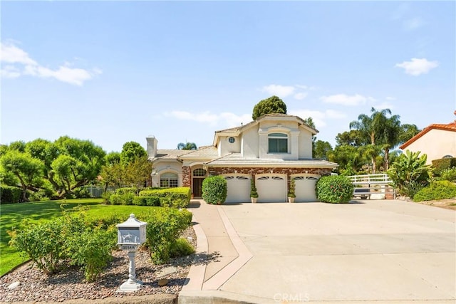 31148 Kahwea Rd, Temecula, CA 92591 - view of front of home with an attached garage, driveway, and stucco siding