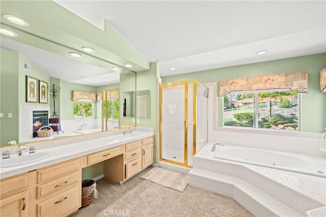 31148 Kahwea Rd, Temecula, CA 92591 - full bathroom with recessed lighting, a shower stall, a tub with jets, and double vanity