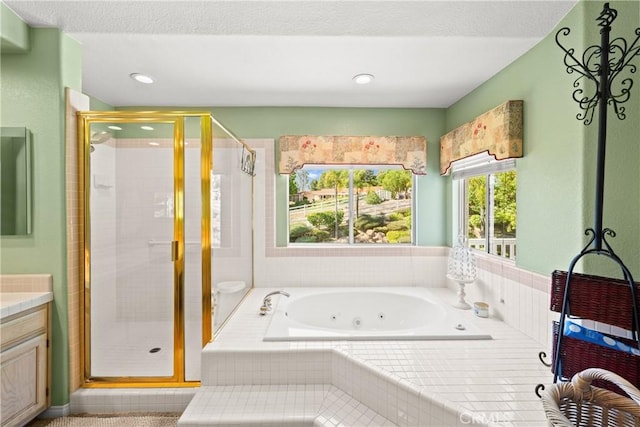 31148 Kahwea Rd, Temecula, CA 92591 - bathroom featuring a jetted tub, vanity, a shower stall, and recessed lighting