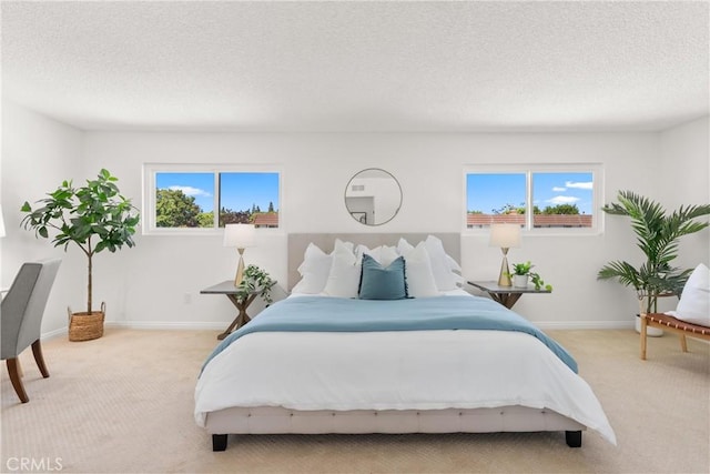 11338 Grand Manan Dr, Cypress, CA 90630 - bedroom with light colored carpet, a textured ceiling, and multiple windows