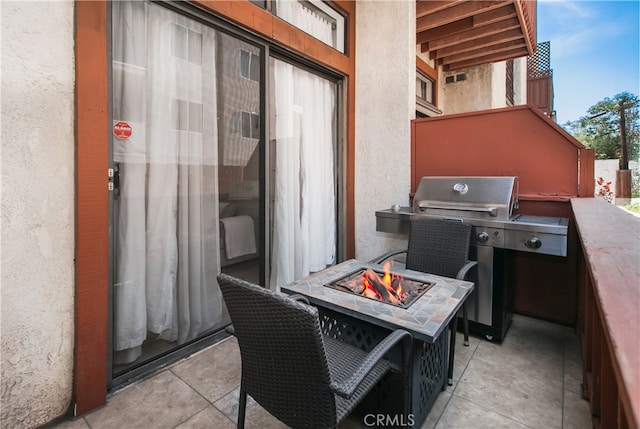13632 Valerio St Unit 2, Van Nuys, CA 91405 - view of patio featuring a fire pit and grilling area