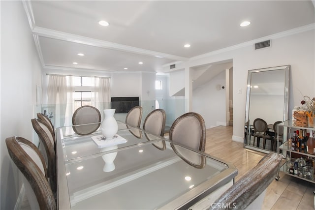 13632 Valerio St Unit 2, Van Nuys, CA 91405 - dining space with light wood-style floors, ornamental molding, and recessed lighting