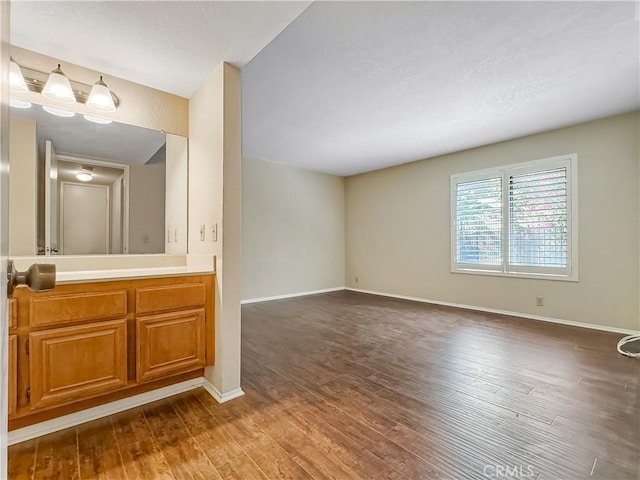 600 Central Ave Unit 323, Riverside, CA 92507 - bathroom with wood finished floors and vanity