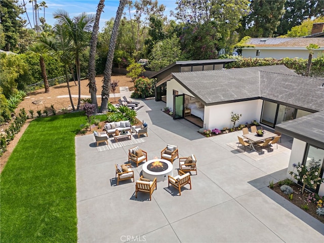 31842 Paseo Cielo, San Juan Capistrano, CA 92675 - view of patio with an outdoor living space with a fire pit, view of wooded area, and outdoor dining space