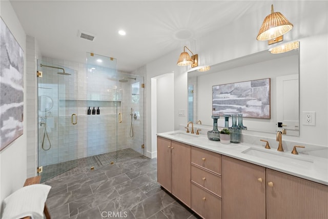 31842 Paseo Cielo, San Juan Capistrano, CA 92675 - bathroom with double vanity, a shower stall, and recessed lighting
