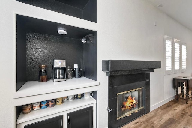 339 Diamante Way, Oceanside, CA 92056 - detailed view of wood finished floors and a tile fireplace