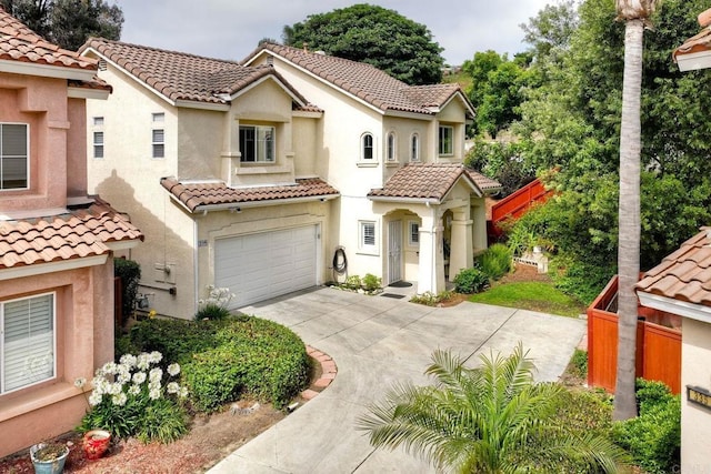 339 Diamante Way, Oceanside, CA 92056 - mediterranean / spanish house with a tile roof, concrete driveway, a garage, and stucco siding