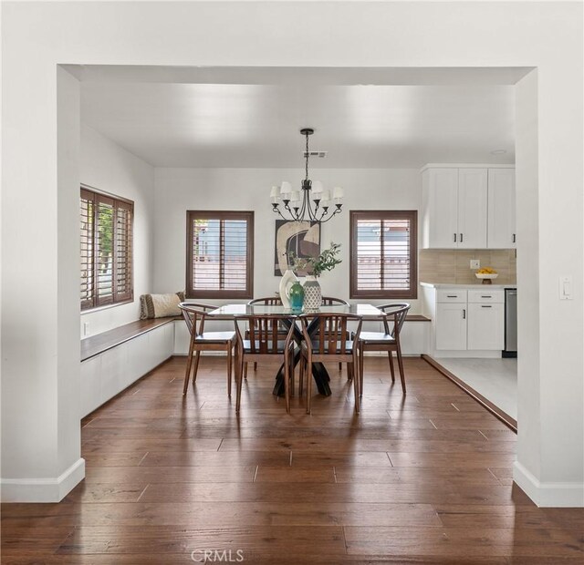 933 N Lincoln St, Burbank, CA 91506 - dining room with a chandelier and dark wood-type flooring