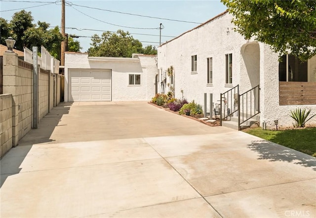 933 N Lincoln St, Burbank, CA 91506 - view of front of house featuring concrete driveway and stucco siding