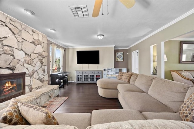 2818 Renegade Ave, Bakersfield, CA 93306 - living room featuring ornamental molding, wood finished floors, a ceiling fan, and a fireplace