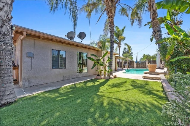 2818 Renegade Ave, Bakersfield, CA 93306 - fenced backyard featuring a patio area