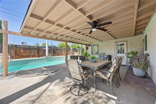 2818 Renegade Ave, Bakersfield, CA 93306 - fenced backyard featuring a patio area, ceiling fan, and outdoor dining space