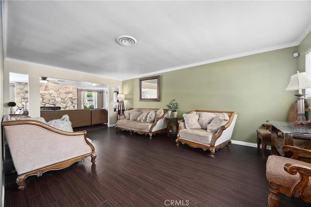 2818 Renegade Ave, Bakersfield, CA 93306 - living area with plenty of natural light, a fireplace, ornamental molding, and wood finished floors